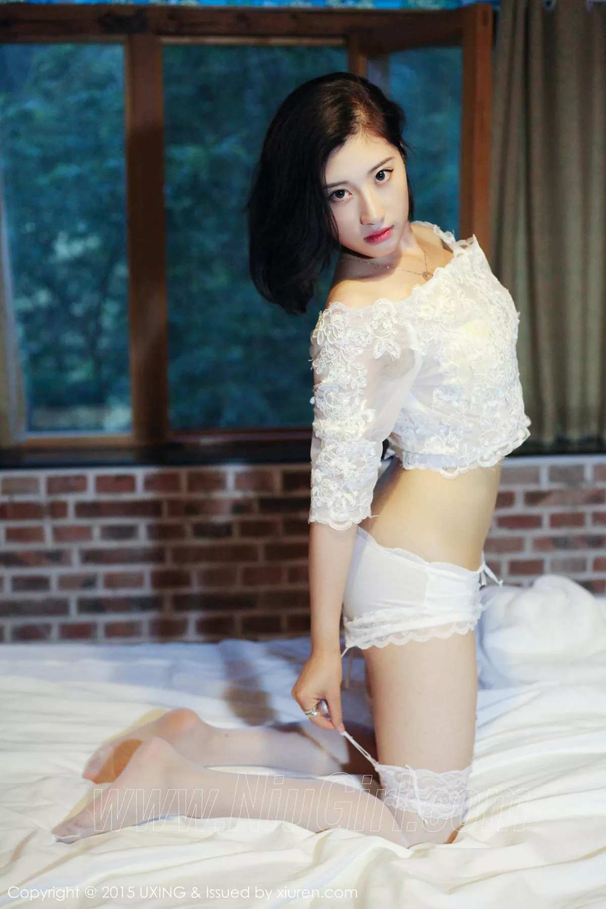 秀人集.com_[UXING优星馆]Vol.014_嫩模Rialer傅雅慧白色蕾丝吊带丝袜性感翘臀写真39P