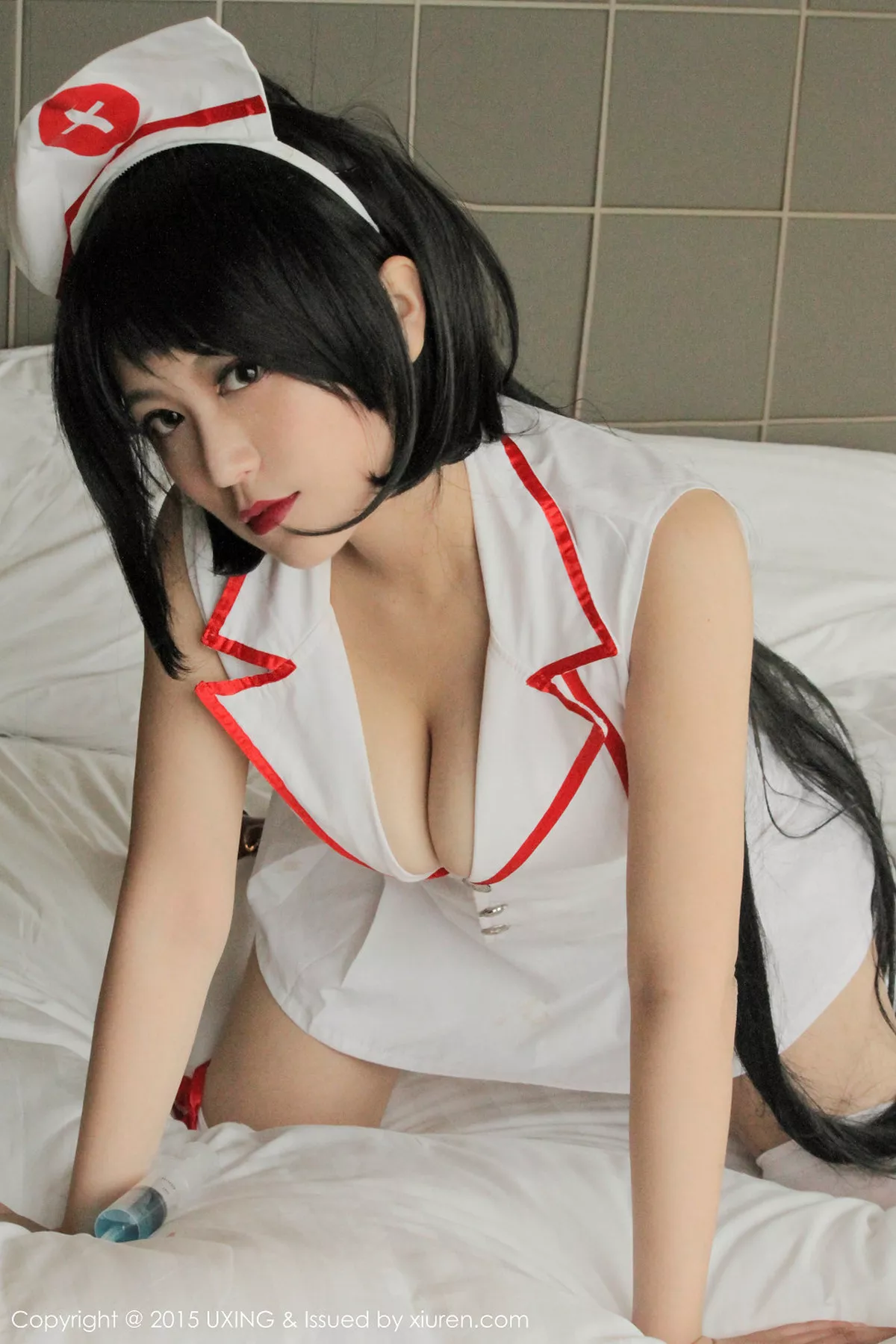 秀人集.com_[UXING优星馆]Vol.016_嫩模莲漪lenne丰满迷人的打针护士诱惑撩人写真51P