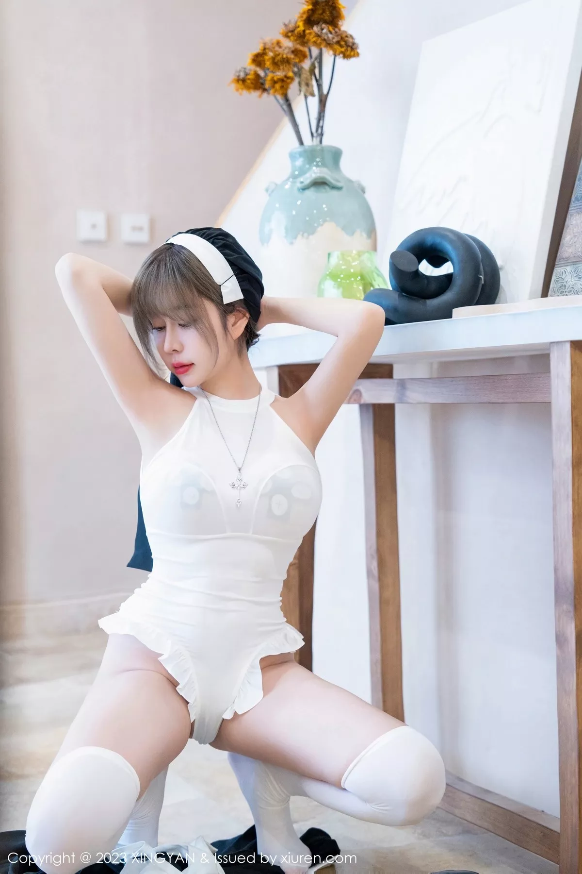 秀人集.com_[XINGYAN星颜社]VOL.187_女神王雨纯半脱修女服饰露白色轻透上衣配白丝袜完美诱惑写真75P